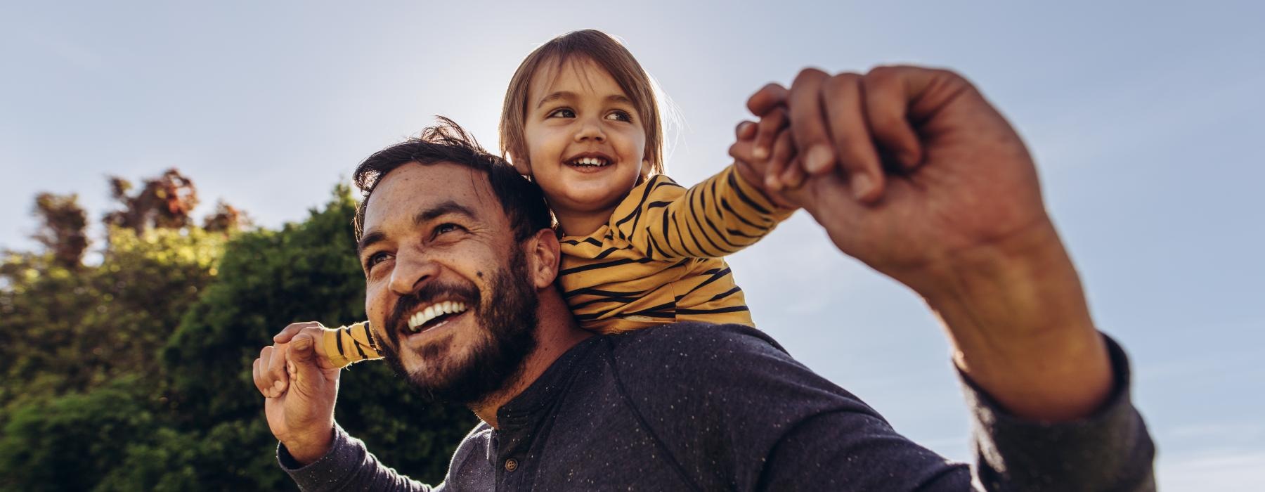 a man holding a child